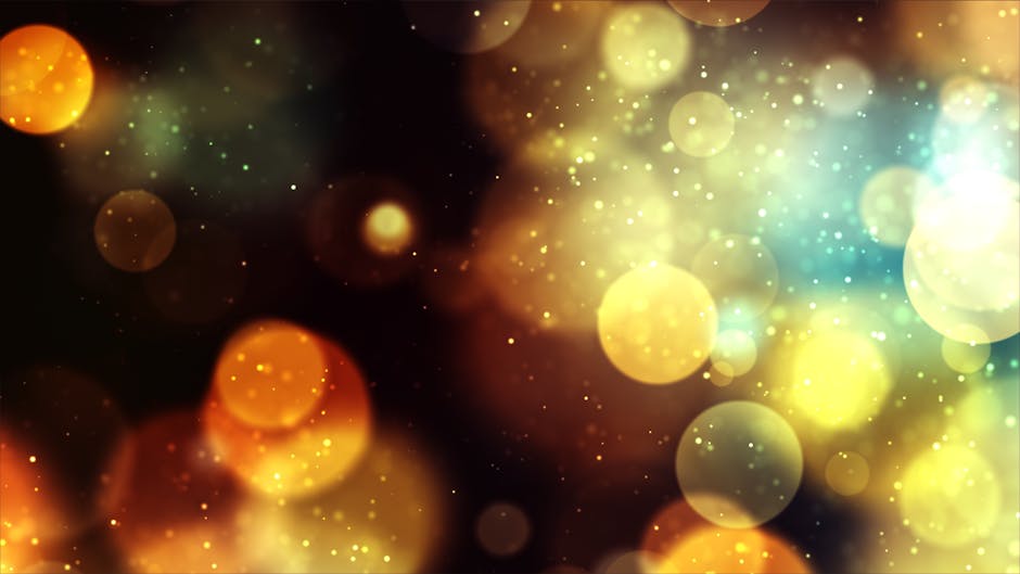 Vibrant bokeh background with golden and blue lights